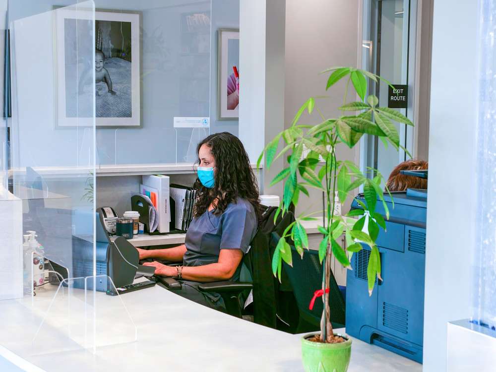 Front desk team member at work