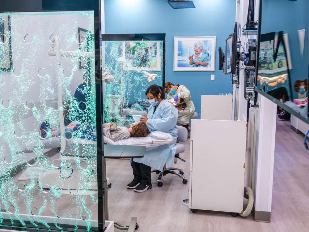 Dentist treating a young patient